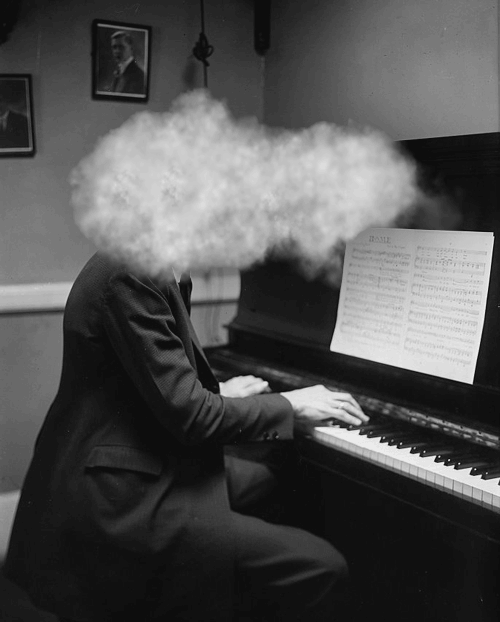 Piano player covered in smoke - Animated GIF by Bill Domonkos