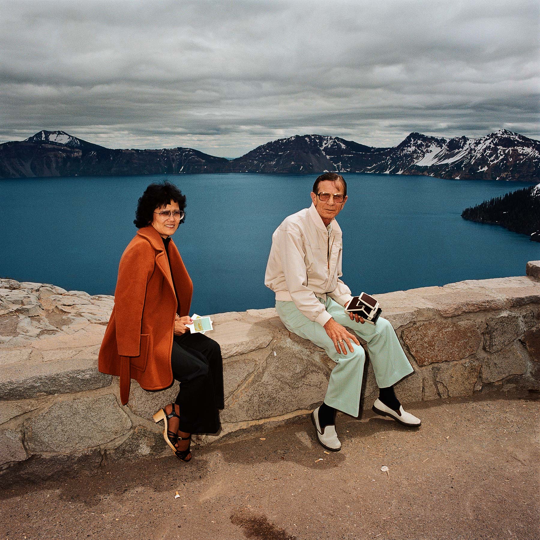 Couple Taking Polaroids, Crater Lake National Park, OR 1980 - Sightseer Series - Photo by Roger Minick