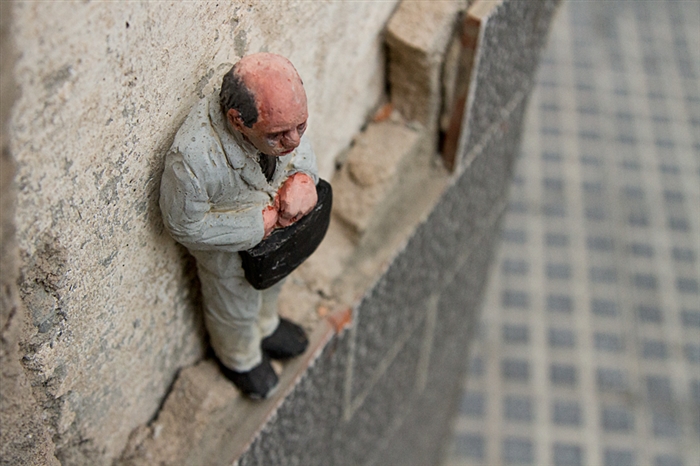 Cement Eclipses - Art by Isaac Cordal