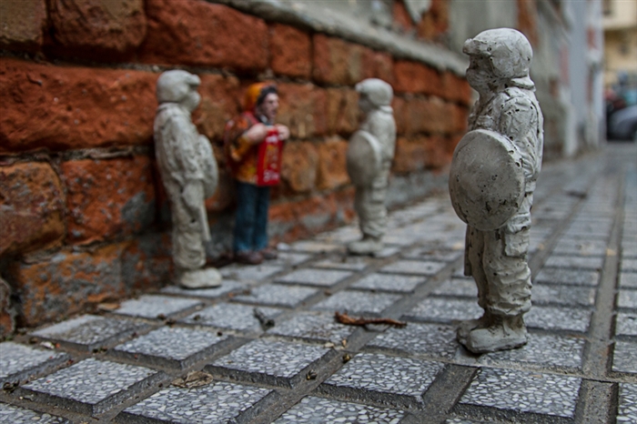 Cement Eclipses - Art by Isaac Cordal