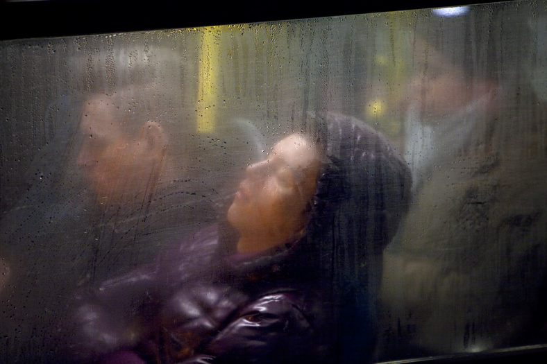 Winter London Bus Passengers - Through a Glass Darkly - Photo by Nick Turpin