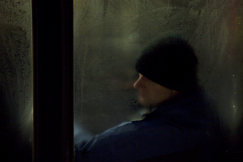 Winter London Bus Passengers - Through a Glass Darkly - Photo by Nick Turpin