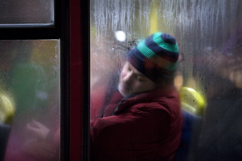 Winter London Bus Passengers - Through a Glass Darkly - Photo by Nick Turpin