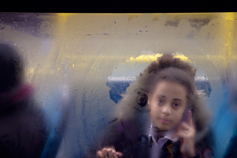 Winter London Bus Passengers - Through a Glass Darkly - Photo by Nick Turpin